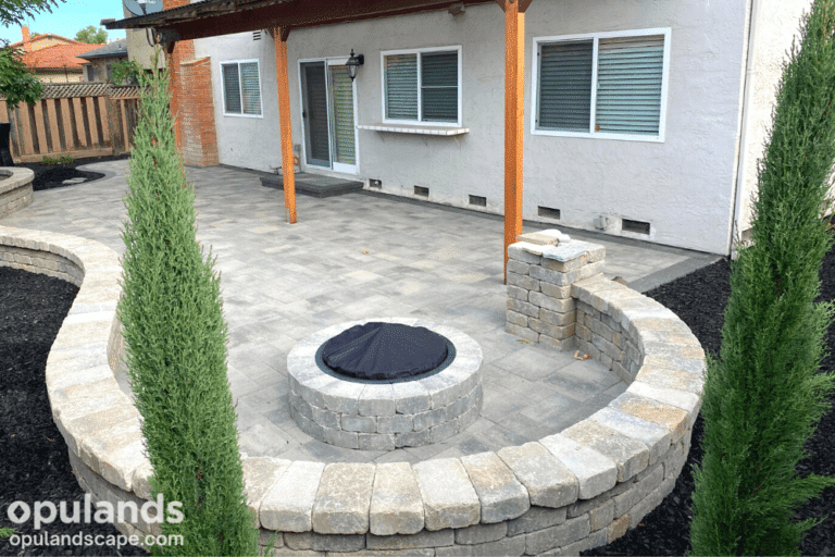 paver patio and fire pit with seating wall