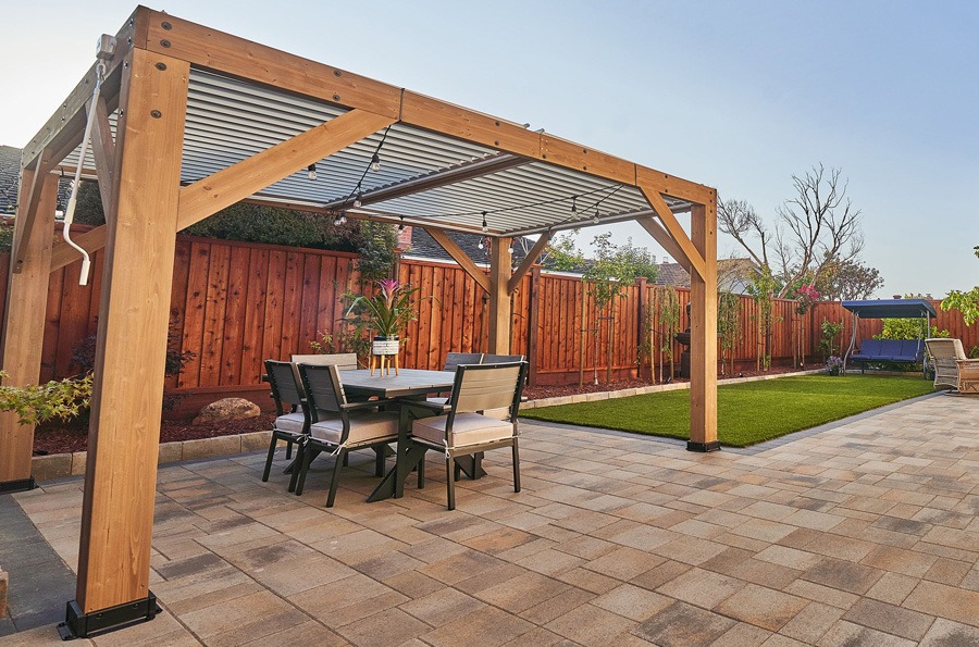 Backyard in San Jose with a wooden pergola