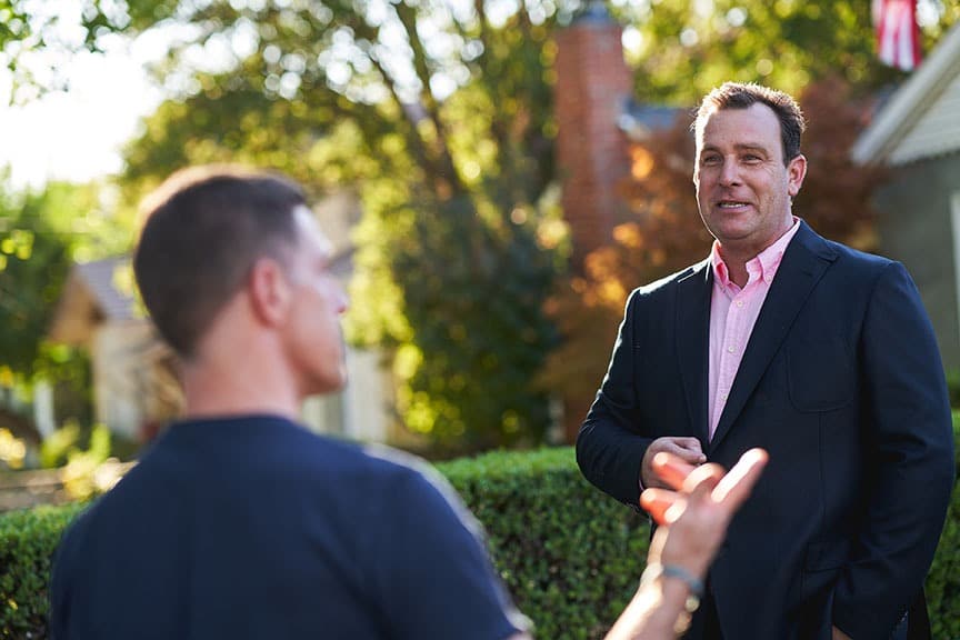 discuss process | Opulands Landscape Design & Construction Steven Van Dongen discussing plan with client
