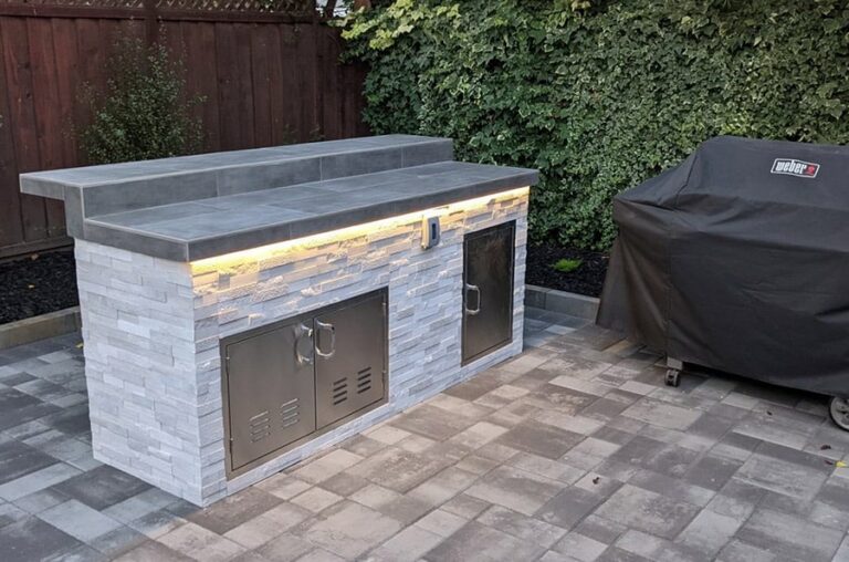 Outdoor kitchen gray backyard