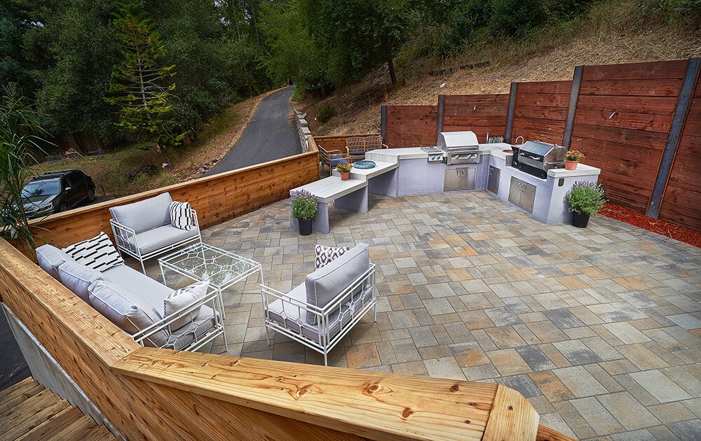 outdoor kitchen paver patio Phillips | Opulands Landscape Design & Construction