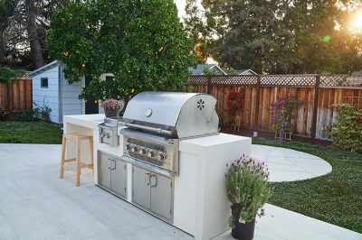 custom outdoor kitchen with BBQ island